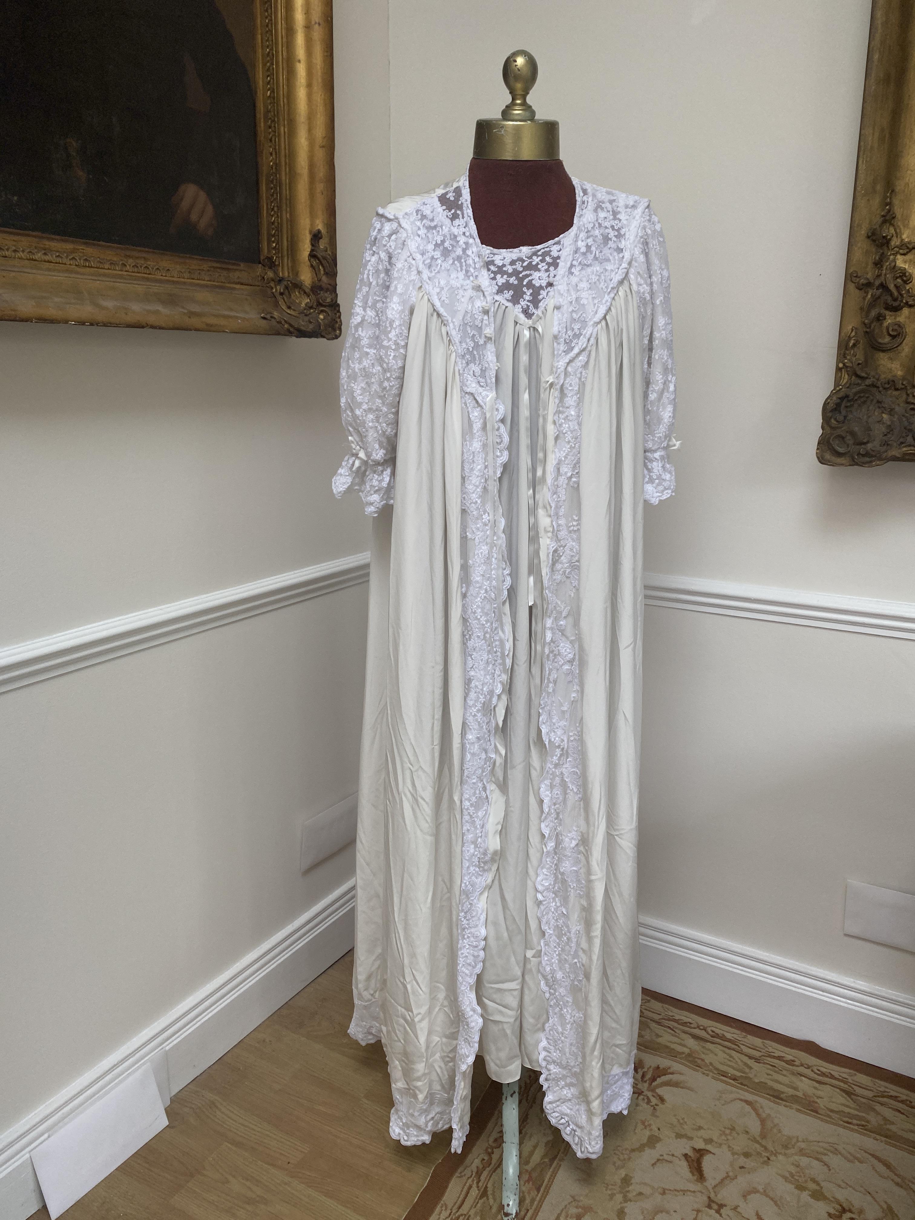 A vintage cotton night gown, a John Lewis night gown and over dressing gown with lace trim, plus mixed blouses some vintage and some with labels from the Royal Opera House